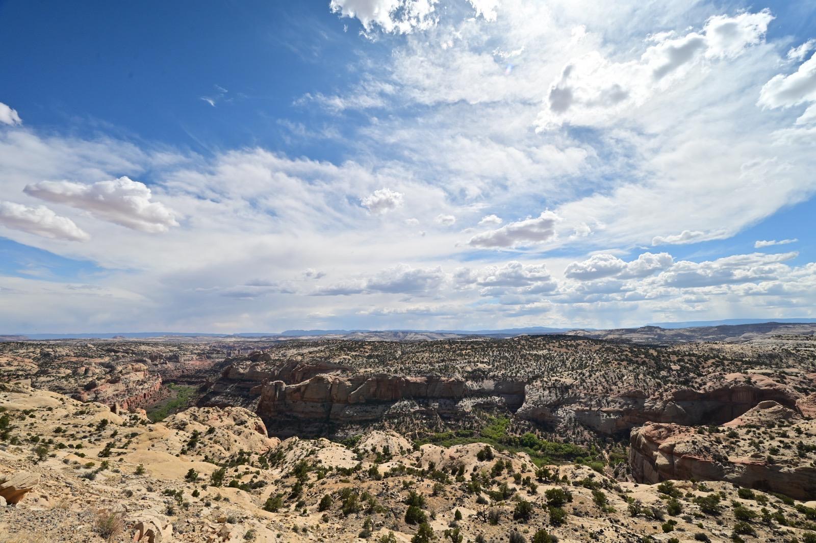 Rocky Mountain landscape beneath a wide blue sky during the journey to ServiceNow Knowledge