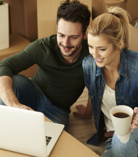 couple using laptop